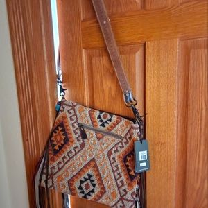 Myra cross body brand new never been used
